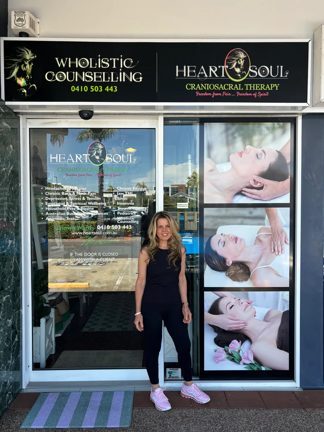 Jasmyn standing at the entrance to the HeartSoul clinic